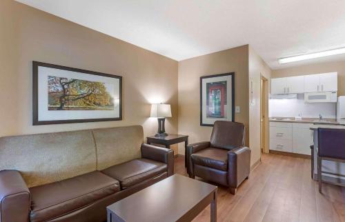 a living room with a couch and chairs in a room at Extended Stay America Suites Washington DC Germantown Town Center in Germantown