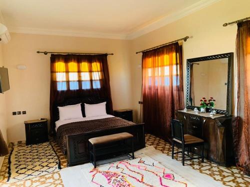 Una cama o camas en una habitación de Villa yanii siin