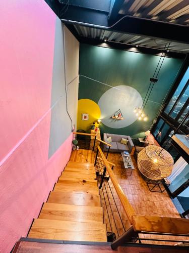 an overhead view of a living room with a table at Loft Industrial Morelia in Morelia