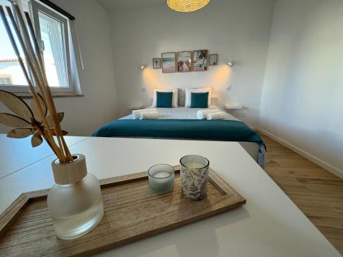 Giường trong phòng chung tại SagresSeaHouse