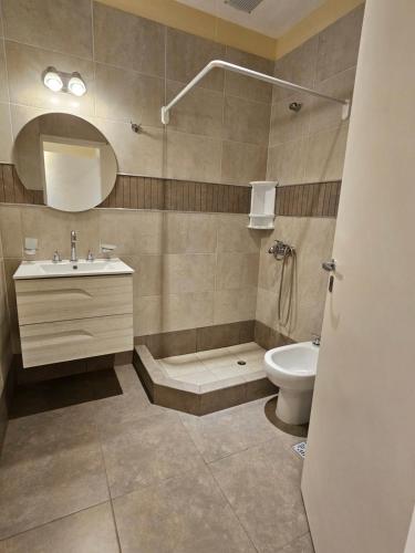 a bathroom with a sink and a toilet at Azcuenaga Sur 2 in Guaymallen