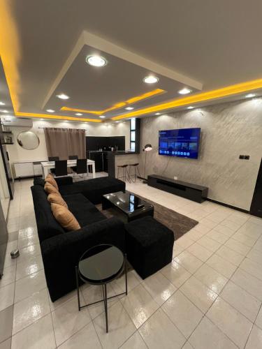 Χώρος καθιστικού στο Le confortable by sdm
