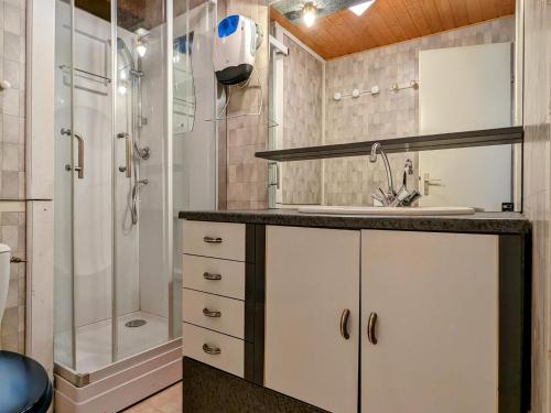 a bathroom with a sink and a shower at Gîte Gérardmer, 2 pièces, 4 personnes - FR-1-589-305 in Gérardmer