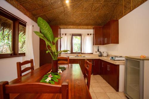Kuchyň nebo kuchyňský kout v ubytování Mandala Spa & Resort Villas