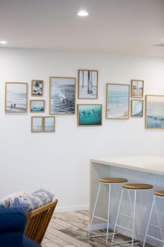 a room with a table and some pictures on the wall at The Rocks Resort Unit GA in Gold Coast