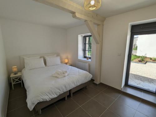 Ένα ή περισσότερα κρεβάτια σε δωμάτιο στο Gîte Huisseau-sur-Mauves, 5 pièces, 10 personnes - FR-1-590-361