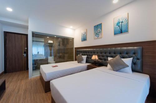 Krevet ili kreveti u jedinici u objektu Marilla Nha Trang Hotel - by Bay Luxury