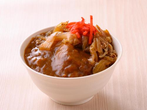 a white bowl of food with meat and vegetables at Centre One Hotel Handa in Handa