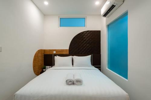 Tempat tidur dalam kamar di Cove De Tinaya