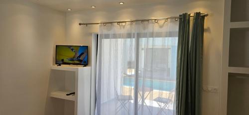 Paradise City Breakにあるテレビまたはエンターテインメントセンター