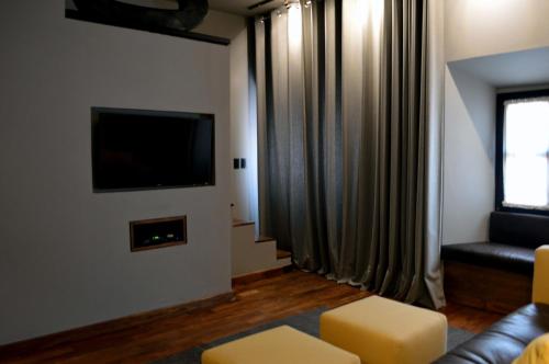TV a/nebo společenská místnost v ubytování Casa de Los Olivos