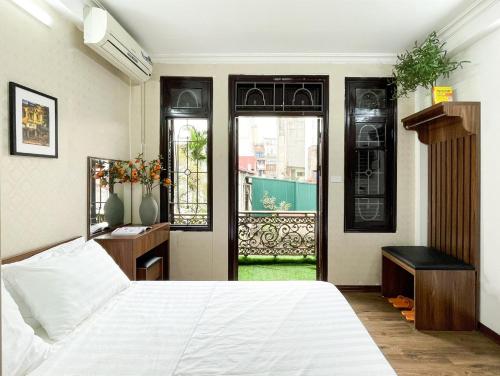Uma cama ou camas num quarto em Hanoi Oriental Viewl Hotel