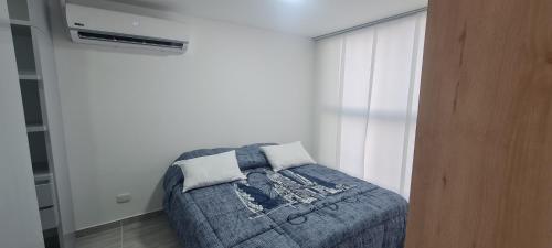 Postel nebo postele na pokoji v ubytování Hermoso y confortable apartamento