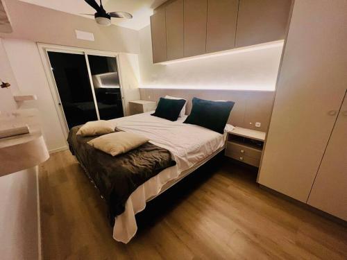 Un pat sau paturi într-o cameră la Sobrado 111