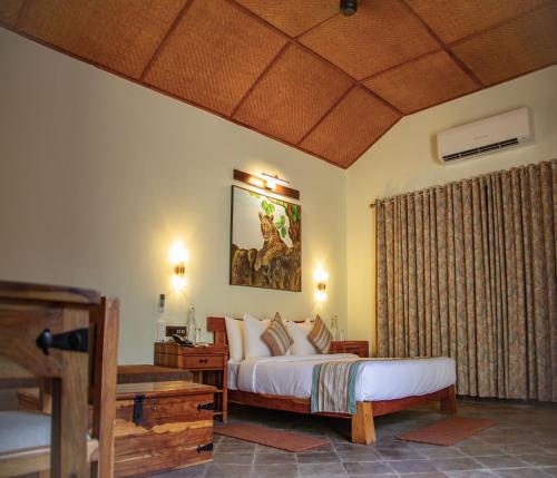 Cama o camas de una habitación en Tathastu Bandhavgarh