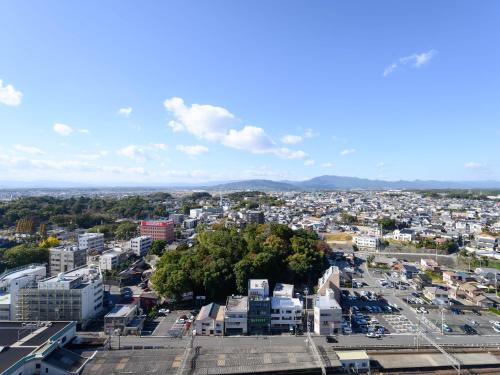 an aerial view of a city with buildings at Hotel Green Park Tsu in Tsu