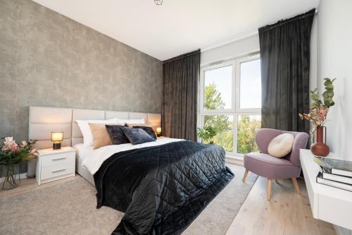 Foto Kopcińskiego Residence - Apartamenty z Parkingiem i Dwoma Łazienkami 1