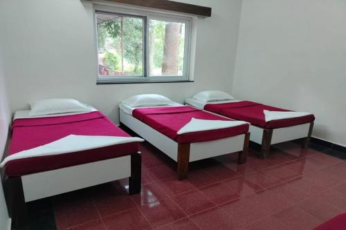 Postel nebo postele na pokoji v ubytování White Water Resort dandeli