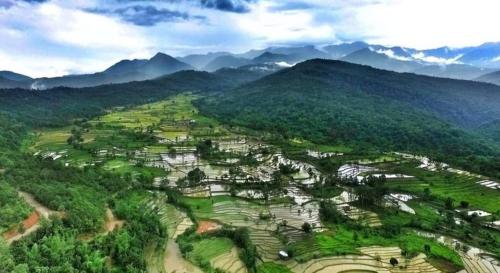 an aerial view of a village in the mountains at Shunyu Homestay, Mima in Kohīma