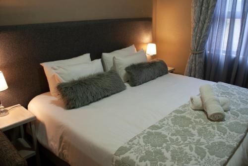 En eller flere senge i et værelse på Casa de la Presa 3