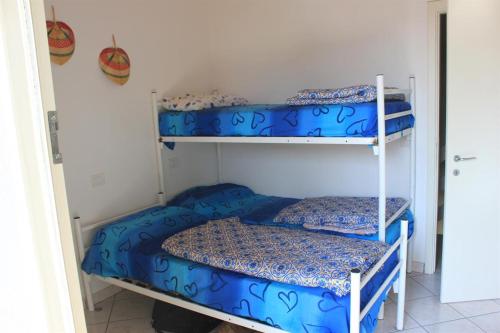 Двох'ярусне ліжко або двоярусні ліжка в номері Casa Pomposa