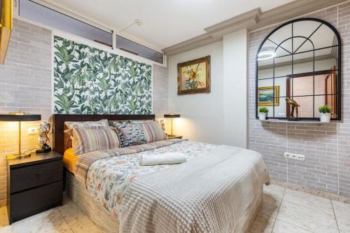 Ένα ή περισσότερα κρεβάτια σε δωμάτιο στο Beachfront Private Apartment in Pueblo Torviscas Sunset Harbour