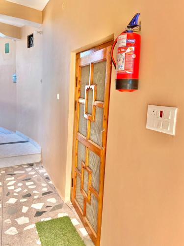 Postel nebo postele na pokoji v ubytování Himdarshan Homestay