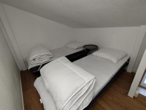 Posteľ alebo postele v izbe v ubytovaní Détente à 80m de la plage et port du Douhet
