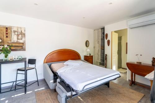 Ένα ή περισσότερα κρεβάτια σε δωμάτιο στο Le Chalet de Josepha