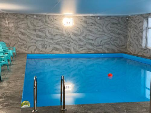 Bazén v ubytování Hotel ELYSIUM nebo v jeho okolí