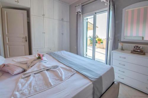 Katil atau katil-katil dalam bilik di Paxoi Serene Oasis - Mylos Mediterranean Charm