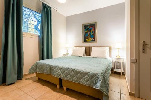 Katil atau katil-katil dalam bilik di Kitries Summer Getaway - Eden Seaside Suite