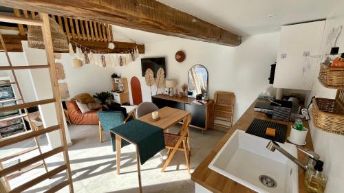 Logement Cosy plein centre village avec mezzanines