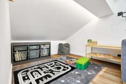 a living room with a black and white rug at Kozlík, Kontryhel by Mountain ways in Abertamy