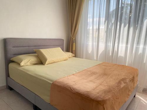 Katil atau katil-katil dalam bilik di Babussalam Glory beach resort