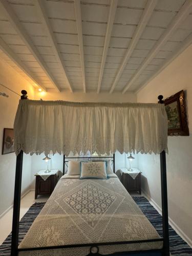Ένα ή περισσότερα κρεβάτια σε δωμάτιο στο Patmos Villas
