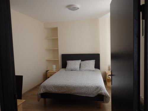 Cama o camas de una habitación en Le Merlanson chambres d'hôtes