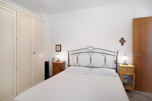 Ένα ή περισσότερα κρεβάτια σε δωμάτιο στο Casa di Lo