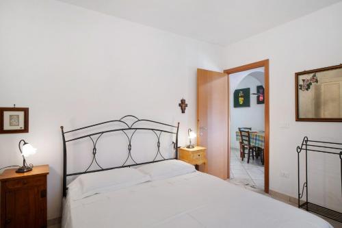 Ένα ή περισσότερα κρεβάτια σε δωμάτιο στο Casa di Lo