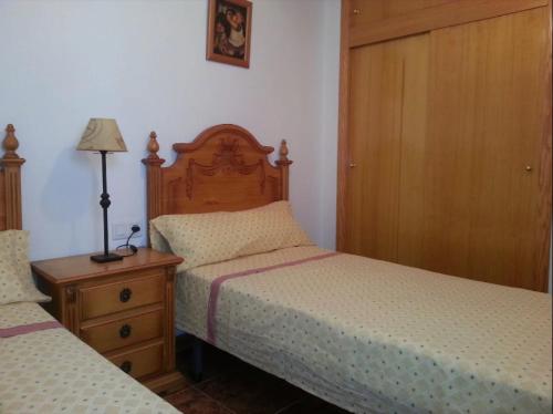 Ένα ή περισσότερα κρεβάτια σε δωμάτιο στο Residencia Lucia