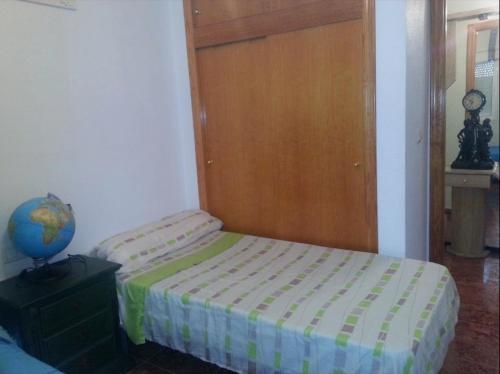 Ένα ή περισσότερα κρεβάτια σε δωμάτιο στο Residencia Lucia