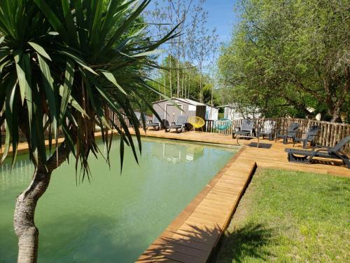 Gallery image of Camping EAU NATURELLE 2 étoiles Bungalow ou Tente 4 personnes dans un environnement calme et dépaysant in Tursac