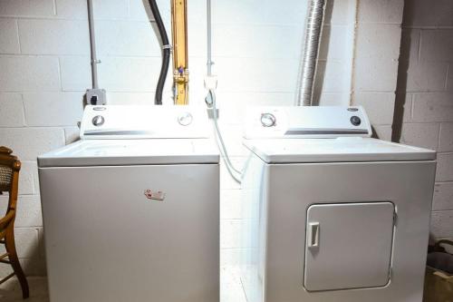 two machines sitting next to each other in a room at Short Walk to Long Pond Swimming Beach in Wellfleet