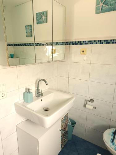 Bilik mandi di Ferienwohnung Schleßmann