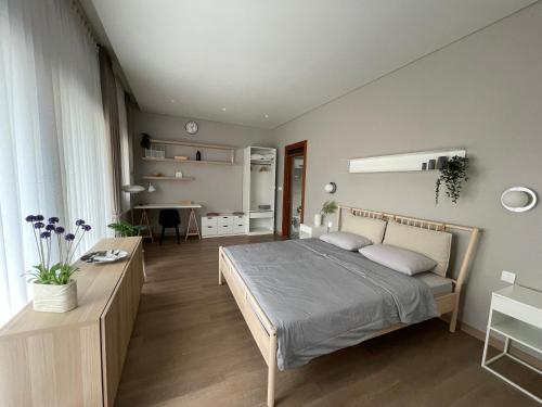 A bed or beds in a room at Lioravilla21