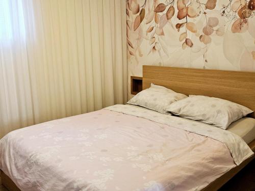 Postel nebo postele na pokoji v ubytování Apartma Kras