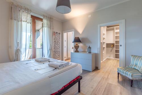 Ένα ή περισσότερα κρεβάτια σε δωμάτιο στο Un quadro sul Chianti