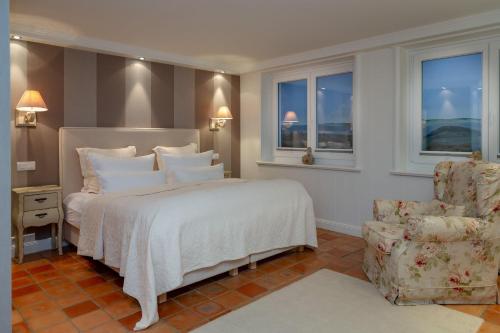 Ένα ή περισσότερα κρεβάτια σε δωμάτιο στο Soenshoern