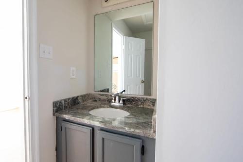 A bathroom at Sojourn 2 Bedroom Townhouse in Virginia Beach
