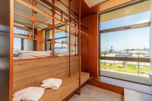 Postel nebo postele na pokoji v ubytování Oniros Residences